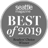 A gray circle with "Seattle Magazine Best of 2019 Readers' Choice Winner" written inside it.